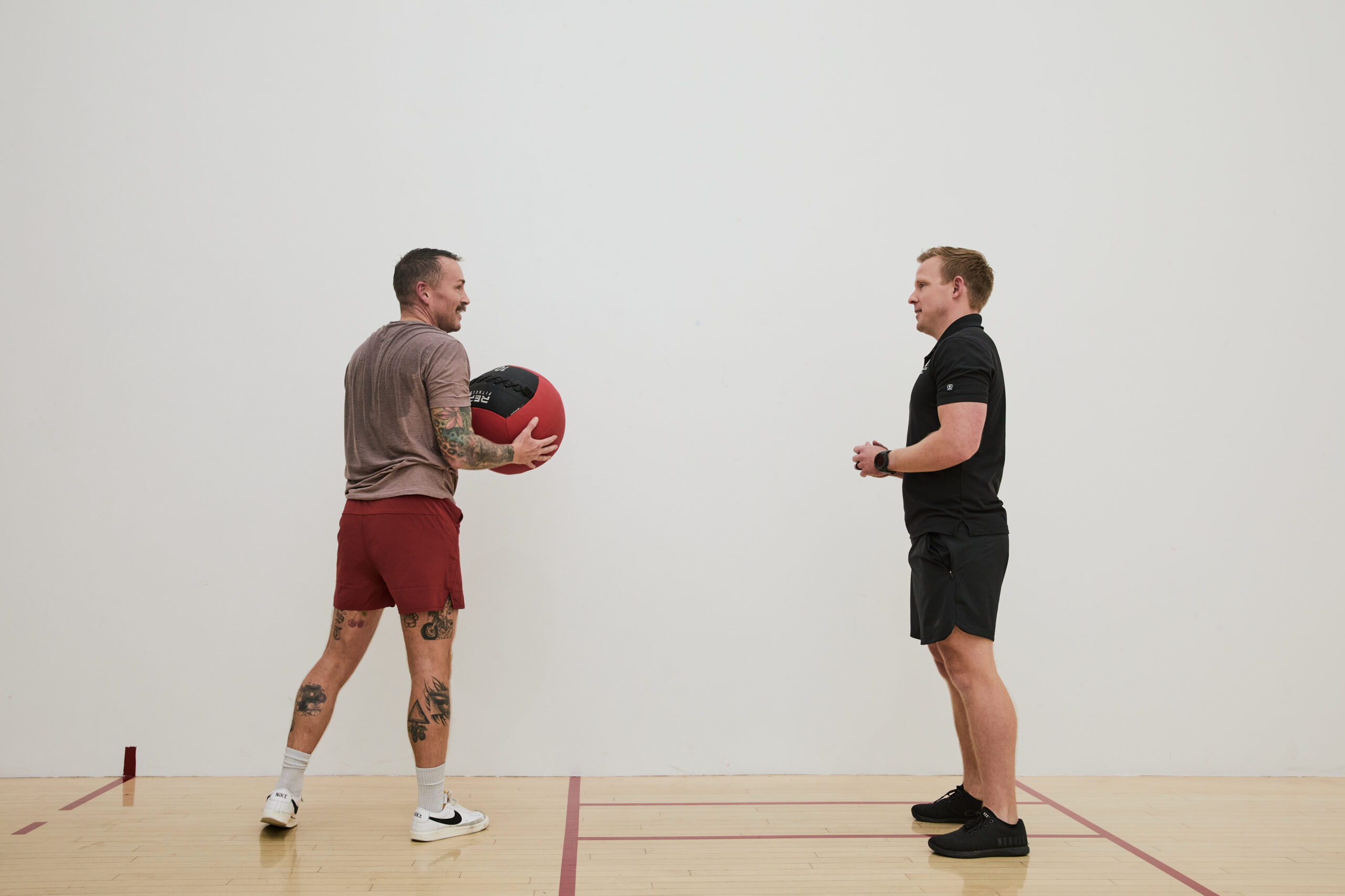 Spokane Club personal fitness trainer working with member