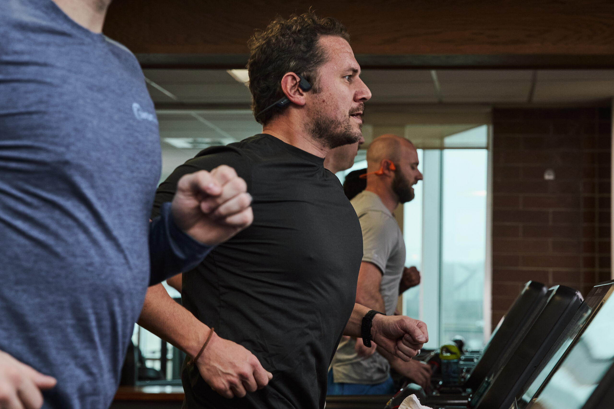 Men running on treadmills in downtown Spokane fitness center Spokane Club